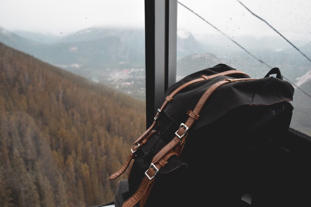 Hiking backpack on mountain gondola seat